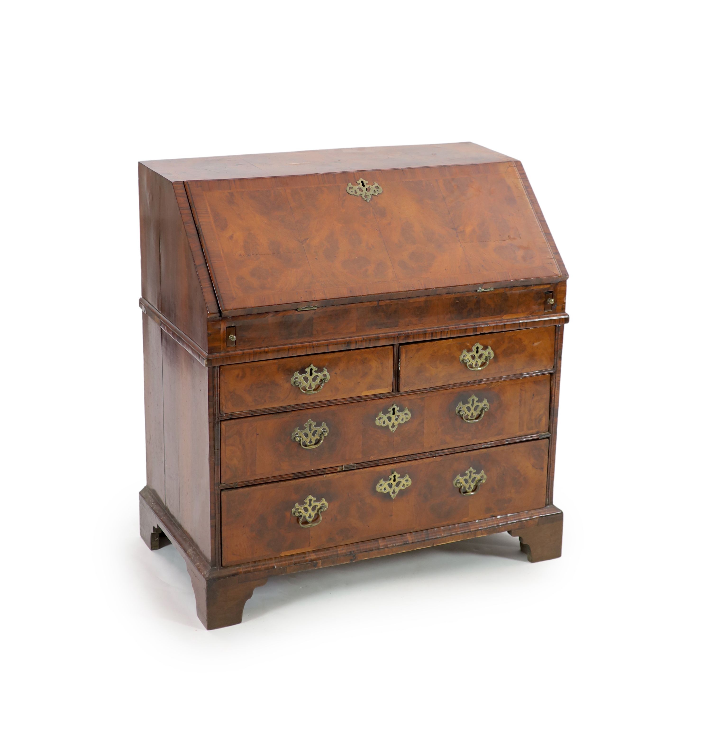 A George I walnut bureau, W.94cm D.52cm H.99cm